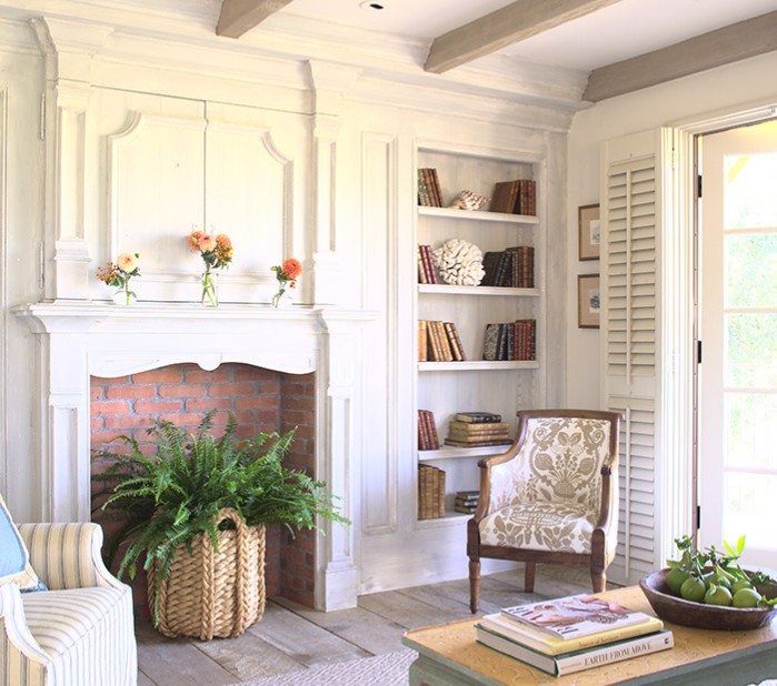 a living room with a fireplace