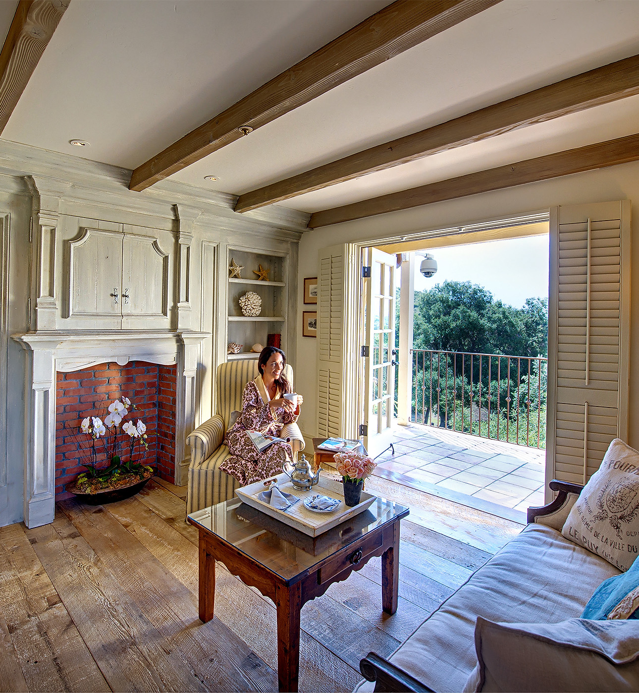 a woman sitting in a living room