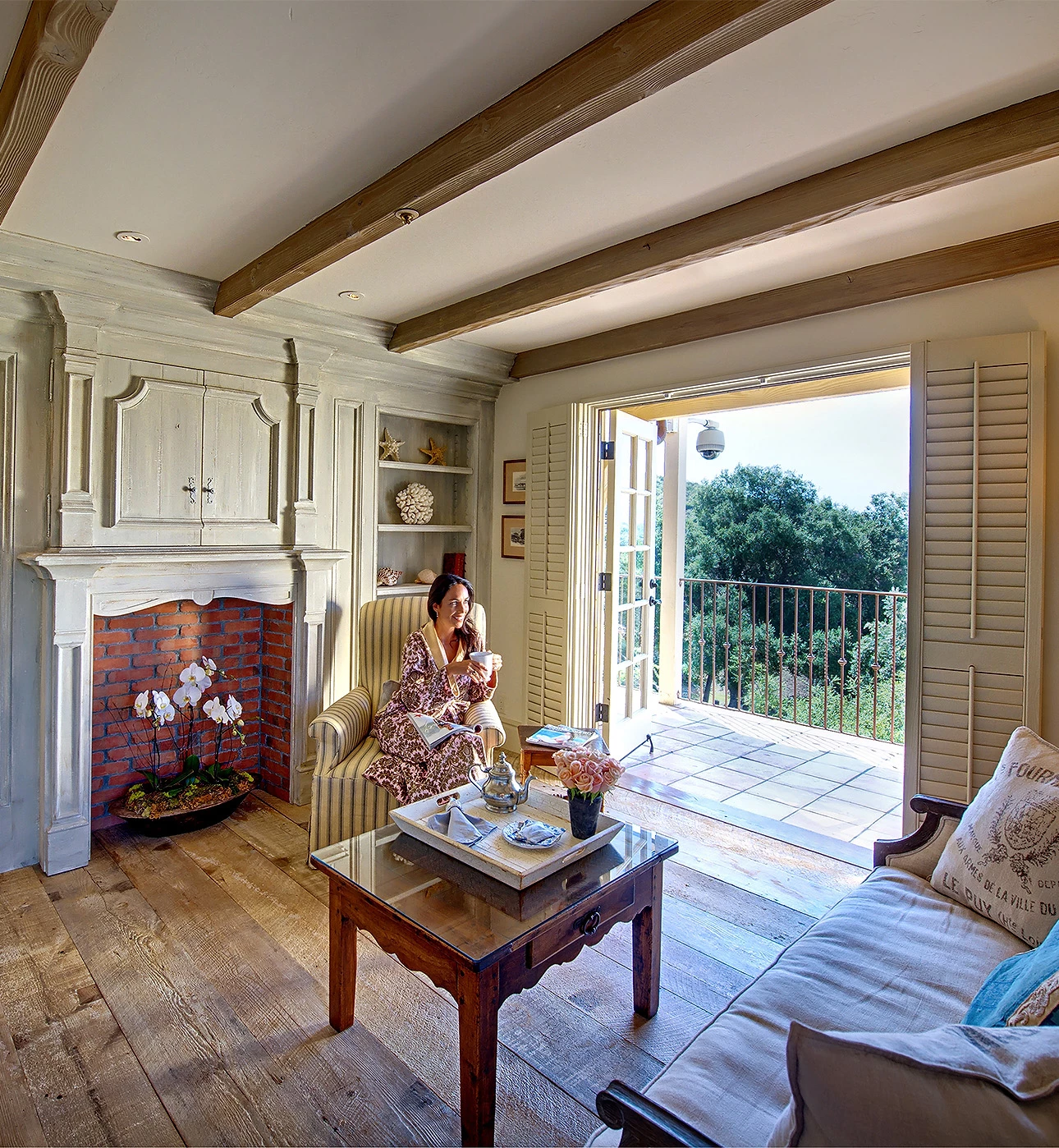 a woman sitting in a living room