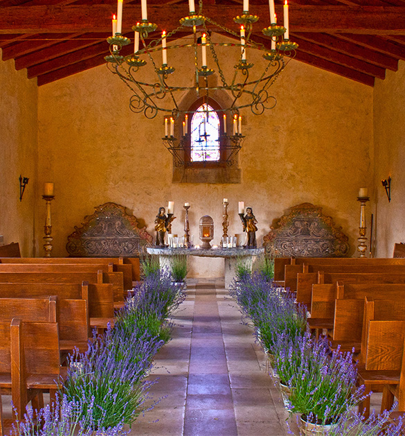 a woman sitting in a room with white bowls