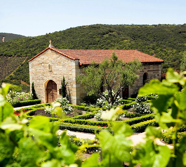 a building with a garden in front of it