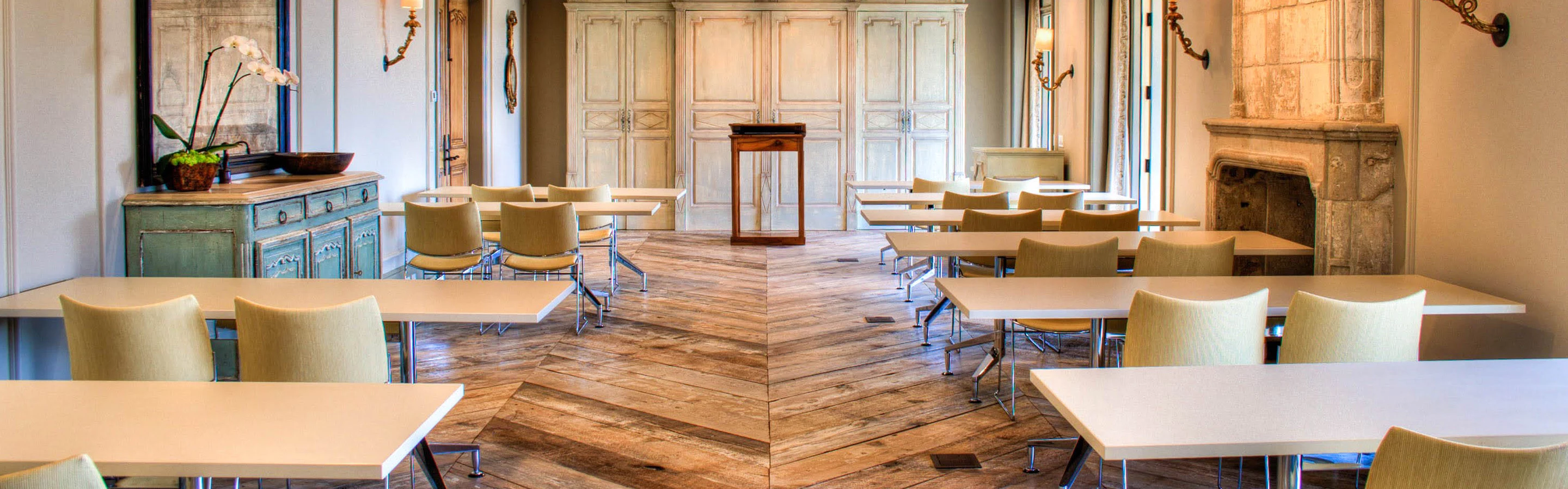 a room with tables and chairs