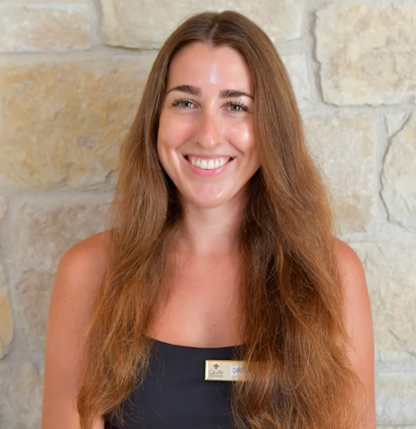 a woman smiling at camera