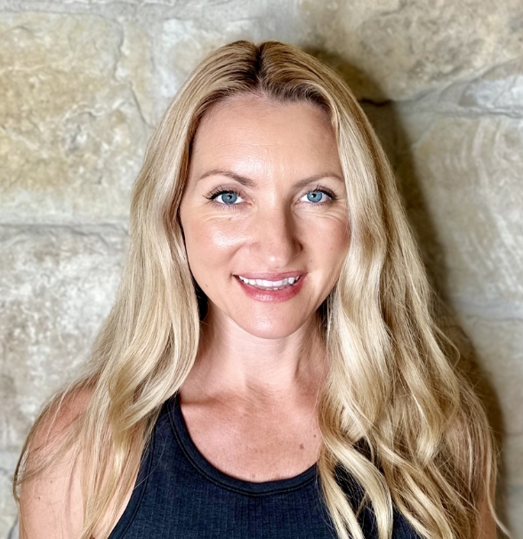 a woman smiling at camera