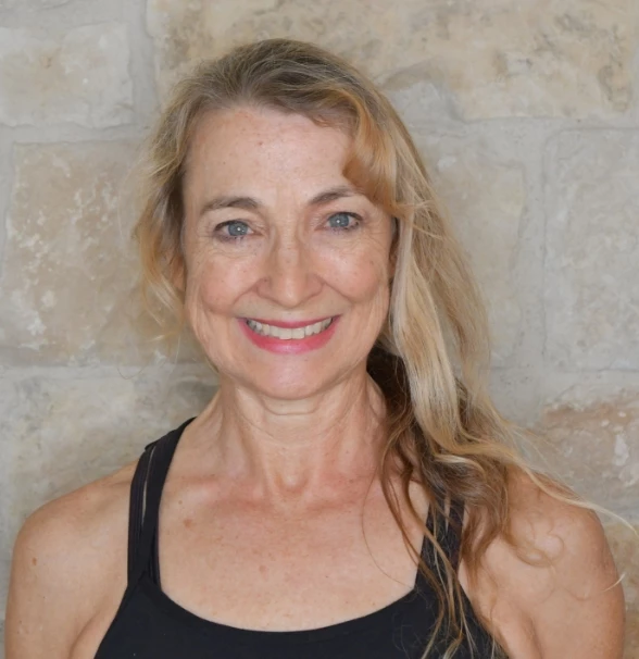 a woman smiling at camera