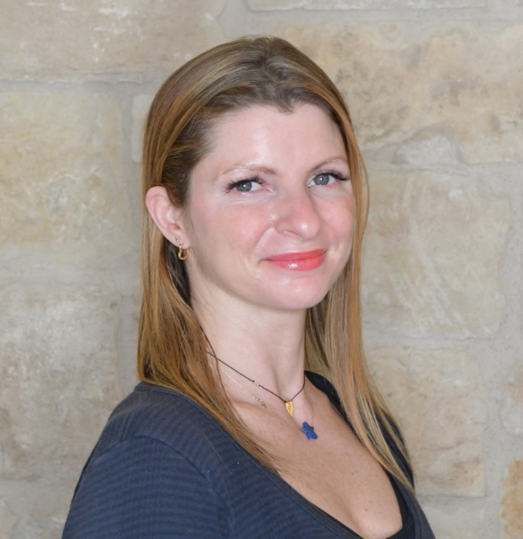 a woman smiling at the camera