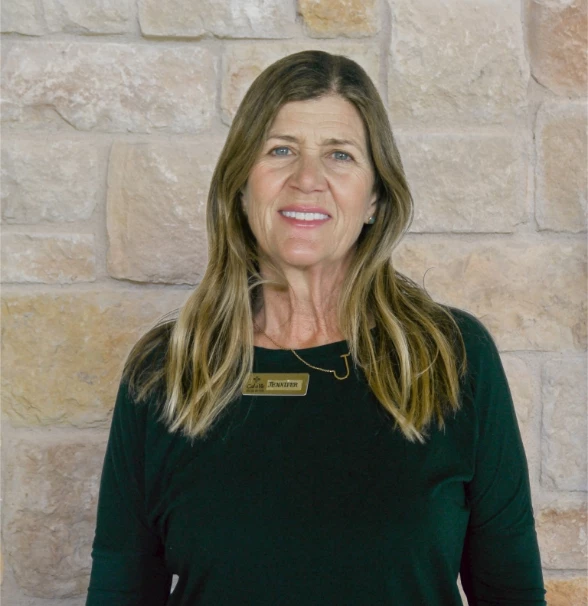 a woman smiling at camera