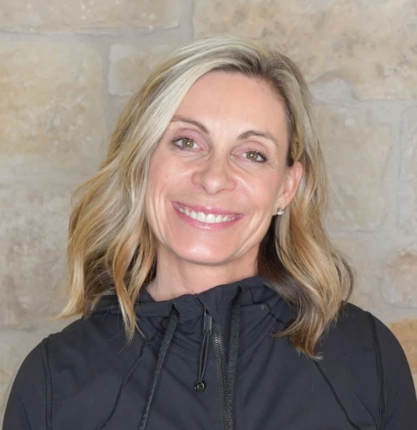 a woman smiling at camera