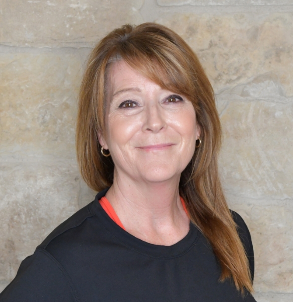 a woman smiling at camera