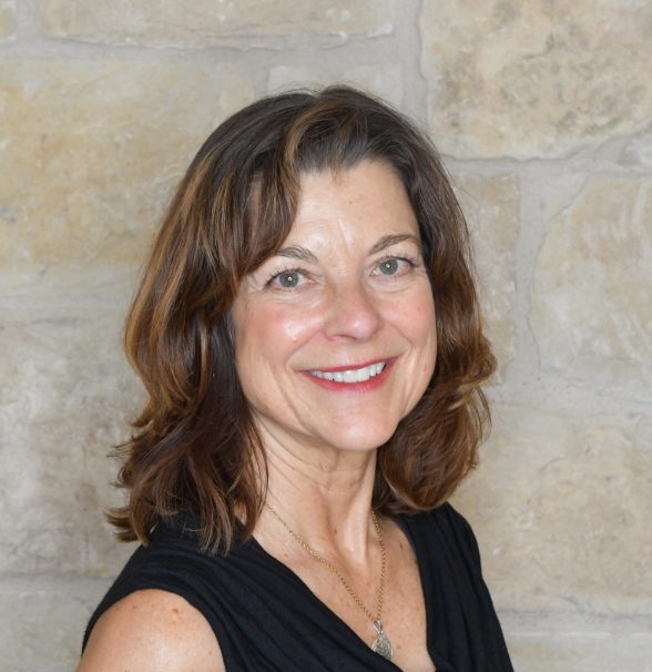 a woman smiling at camera