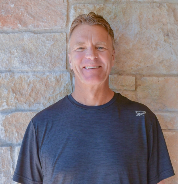 a man smiling at camera