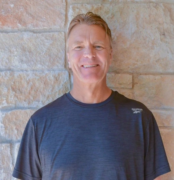 a man smiling at camera