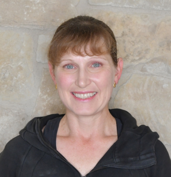 a woman smiling at camera