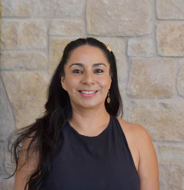 a woman smiling at camera