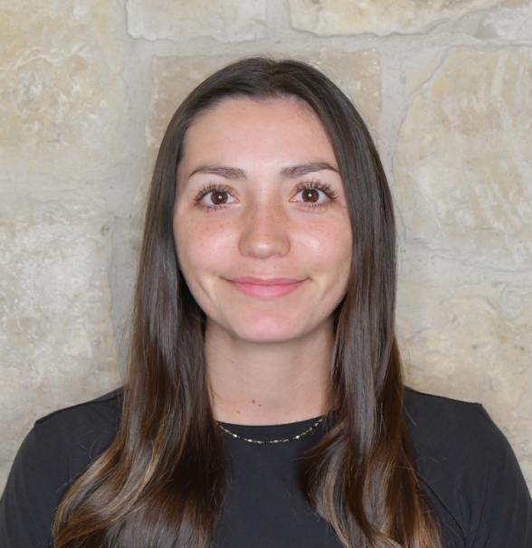a woman with long hair smiling