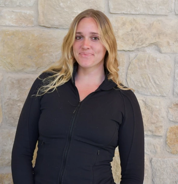 a woman in a black jacket