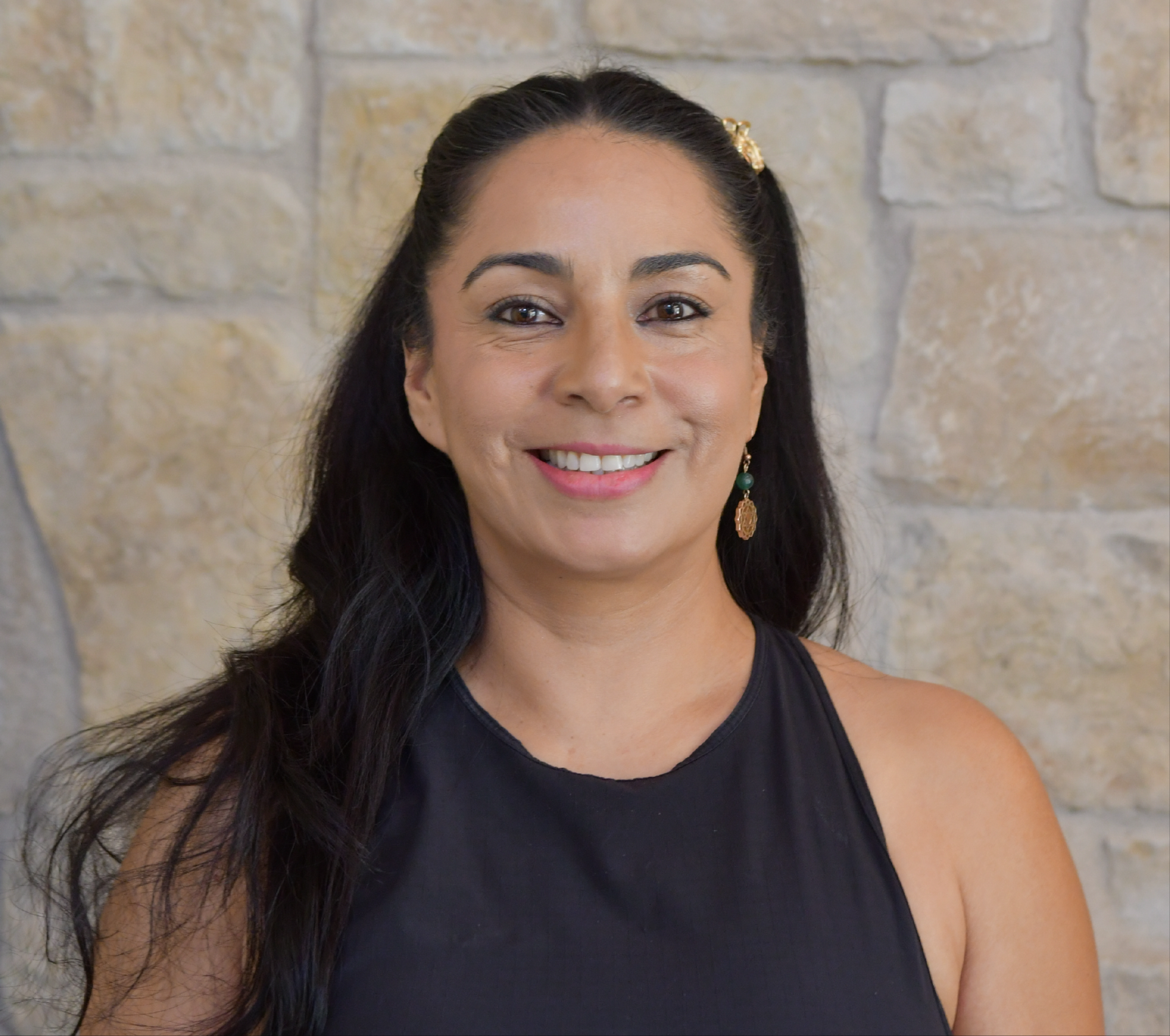 a woman smiling at camera