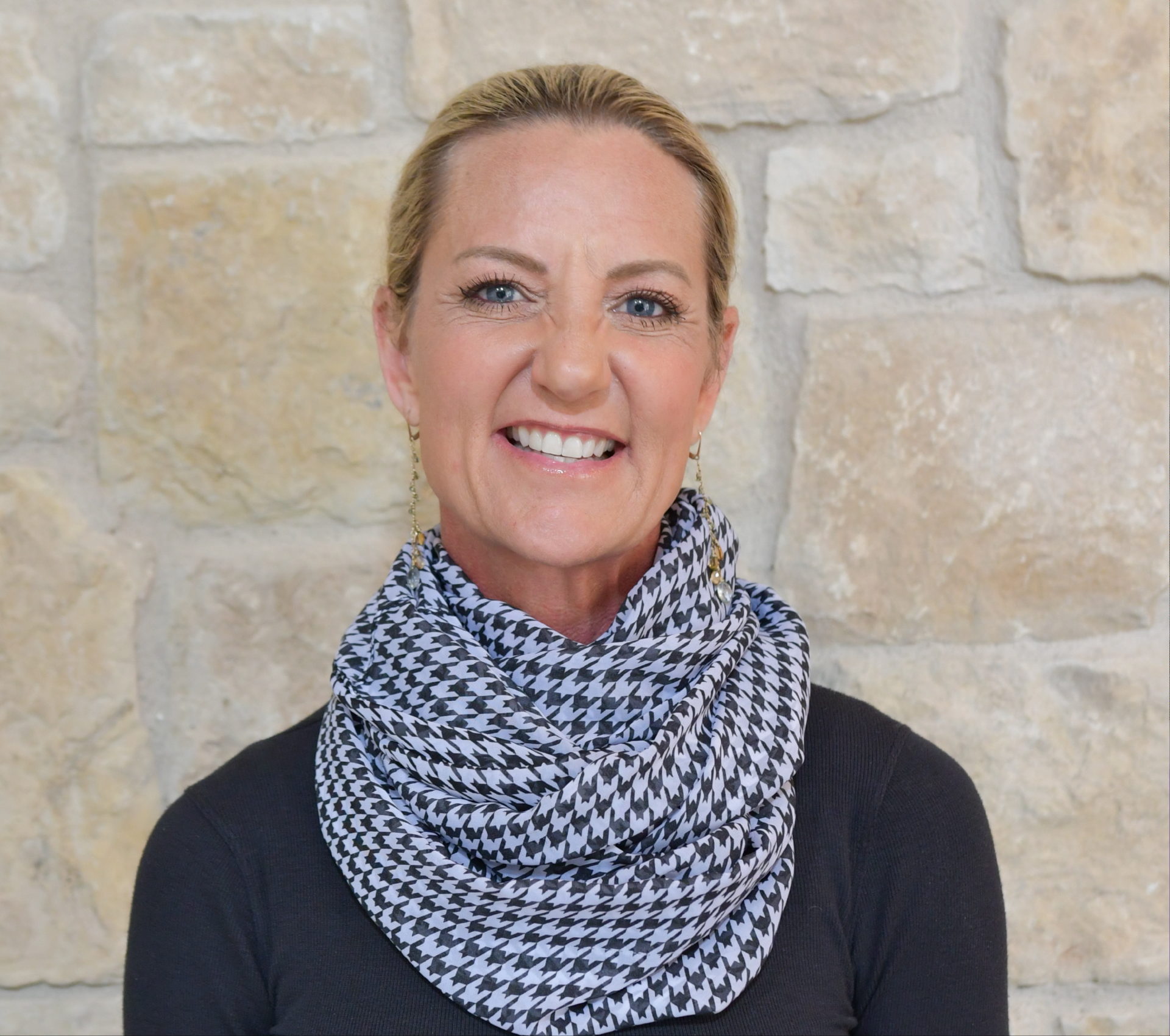 a woman smiling at camera
