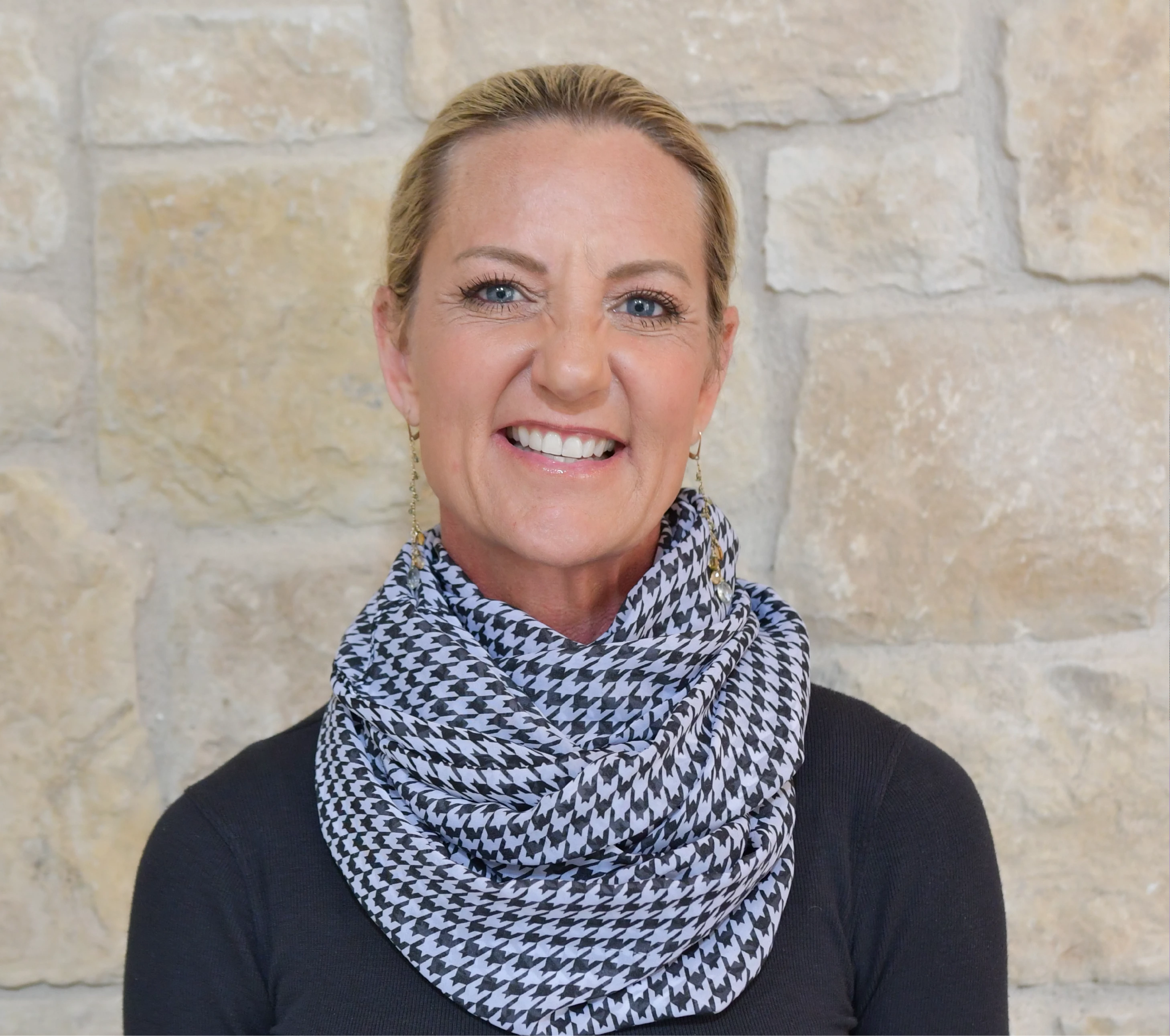 a woman smiling at camera
