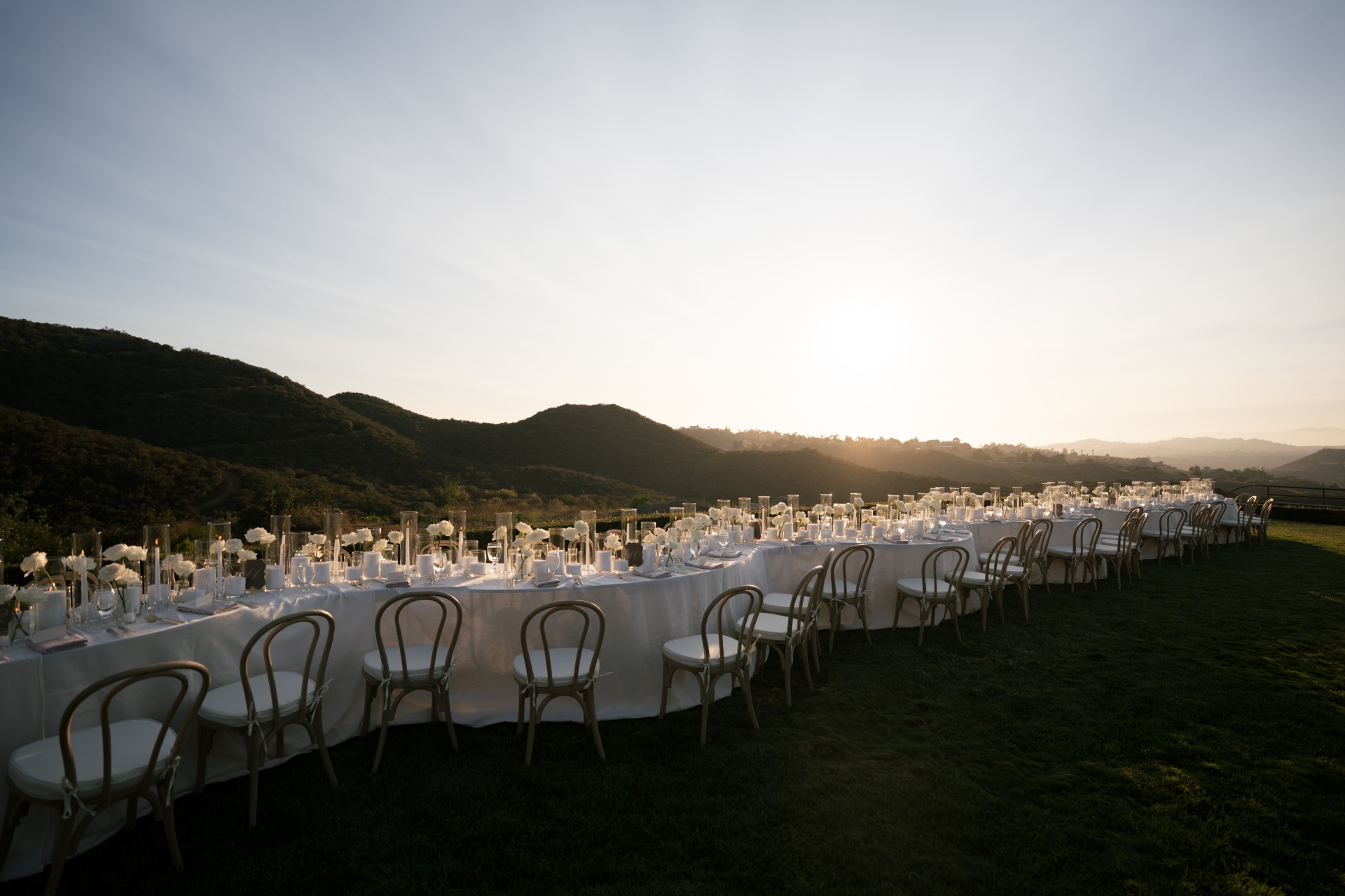 a long table set for a dinner party