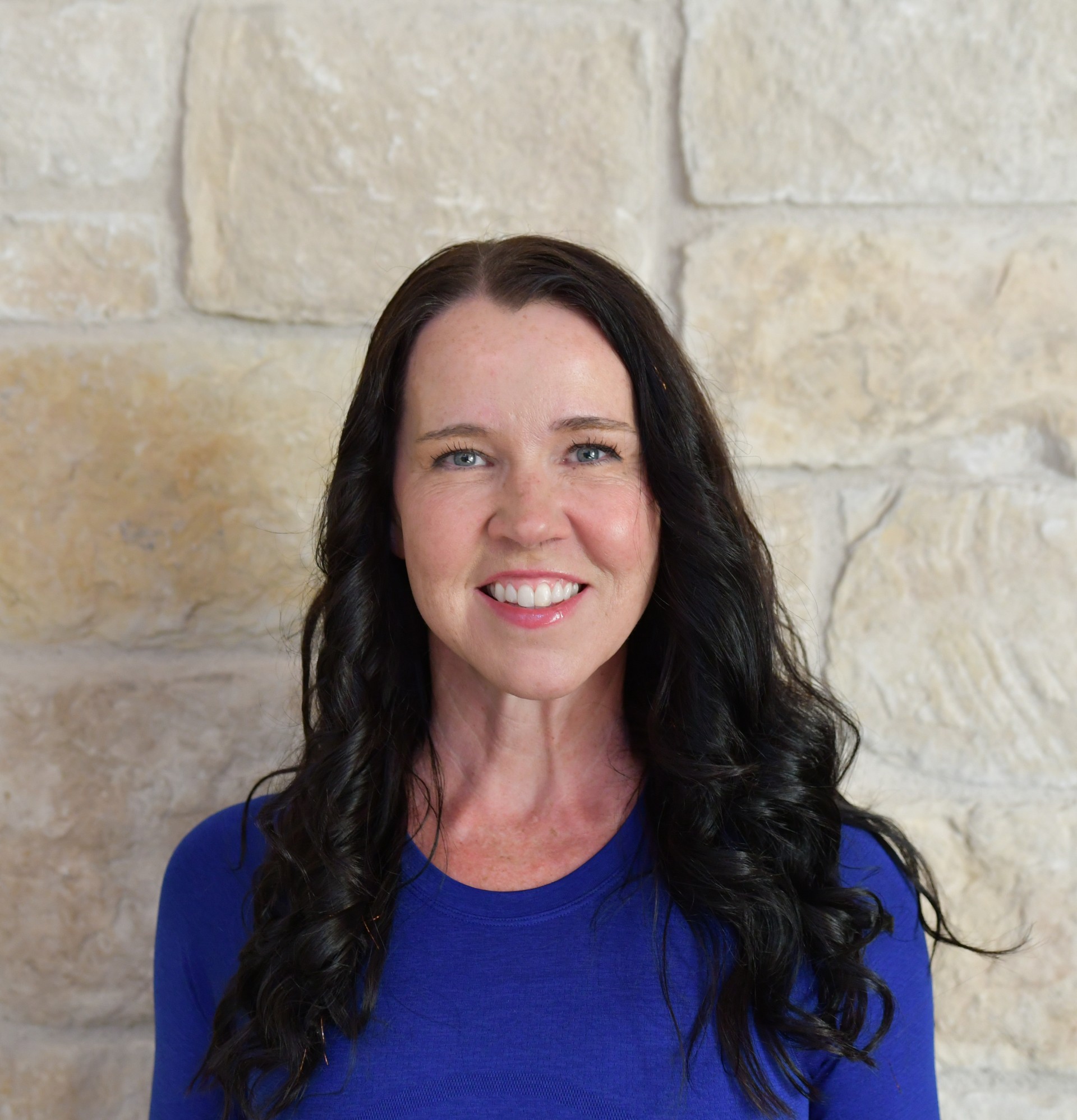 a woman in a blue shirt