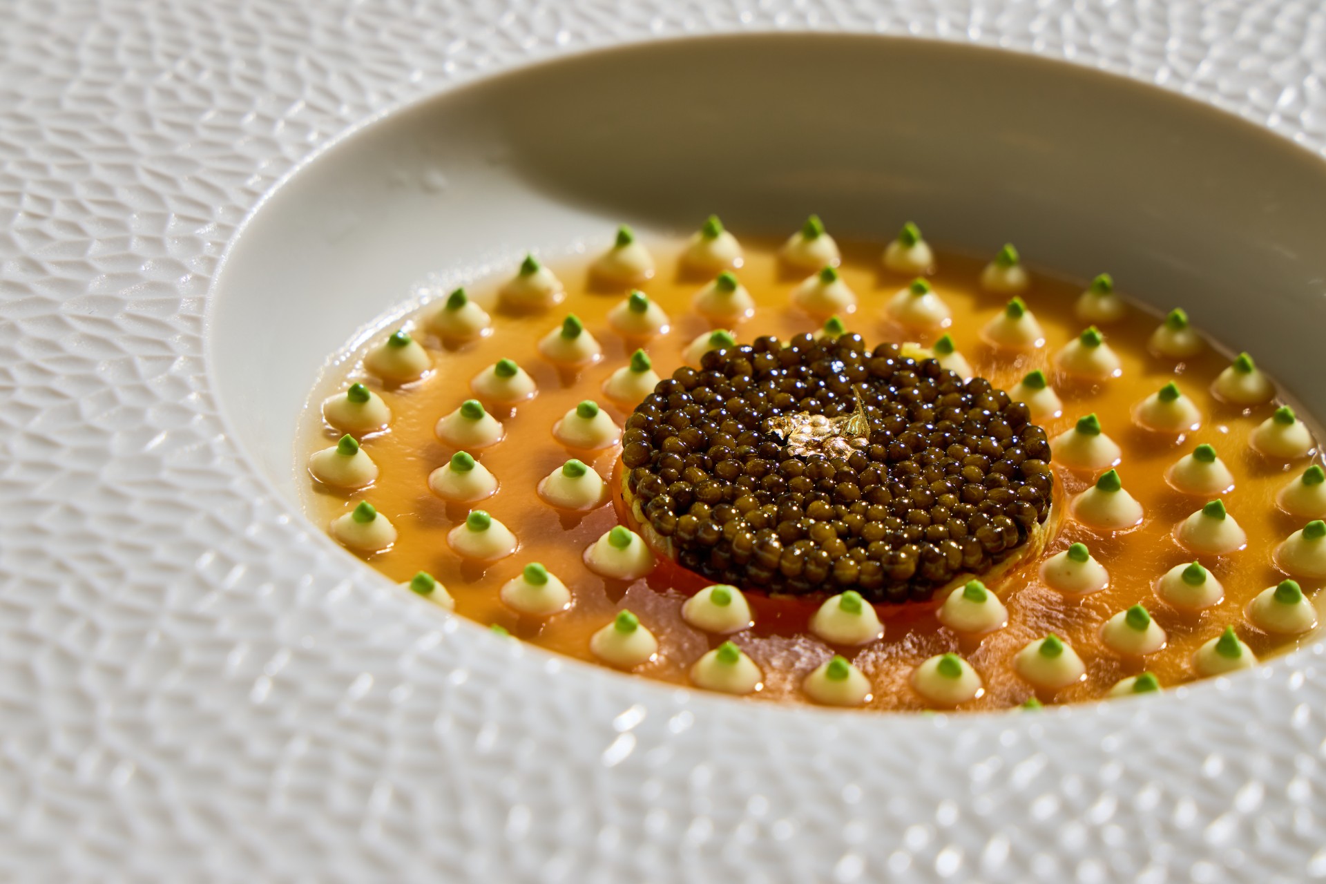 a plate of food with a round object in the center