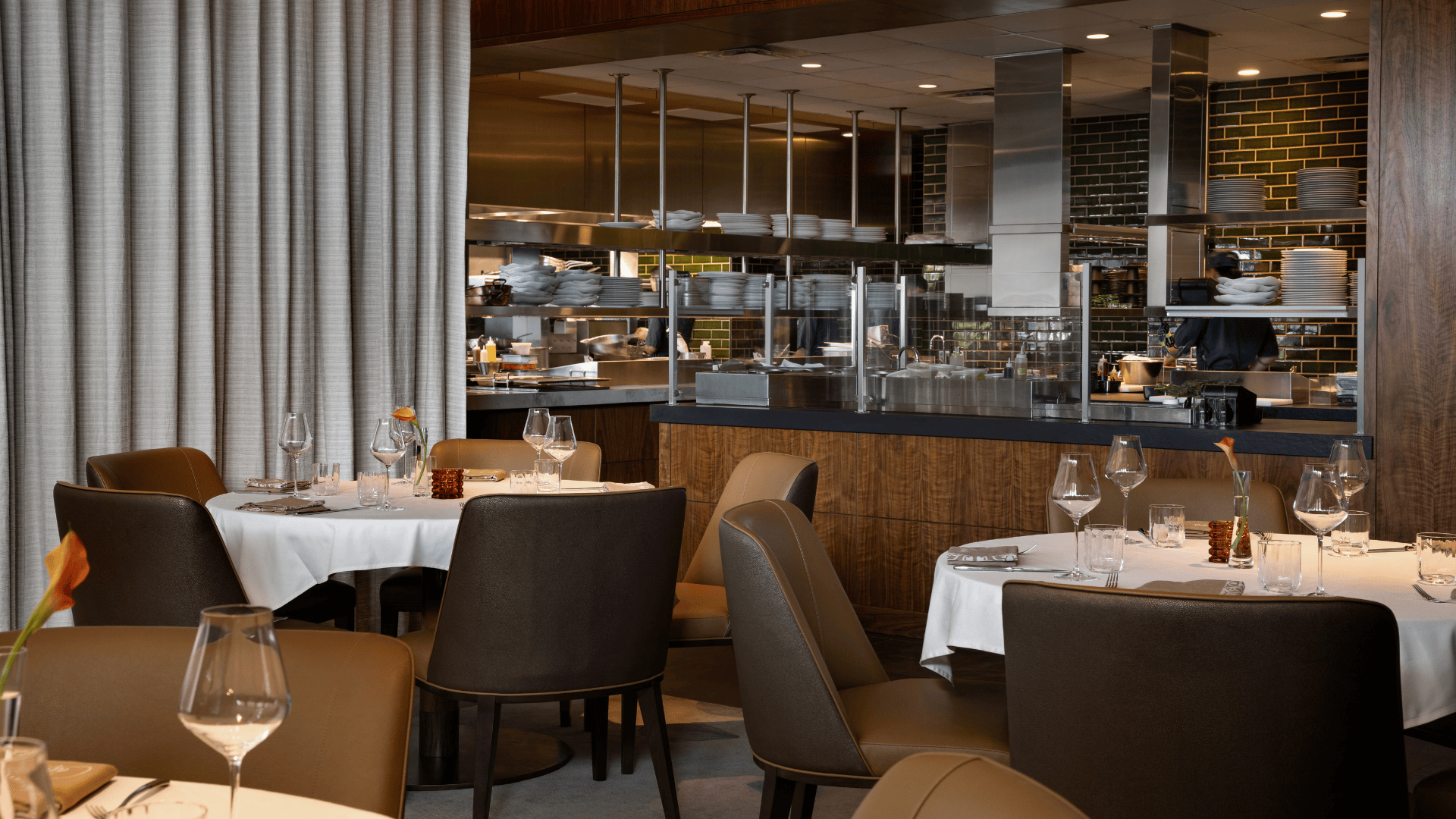 a restaurant with tables and chairs