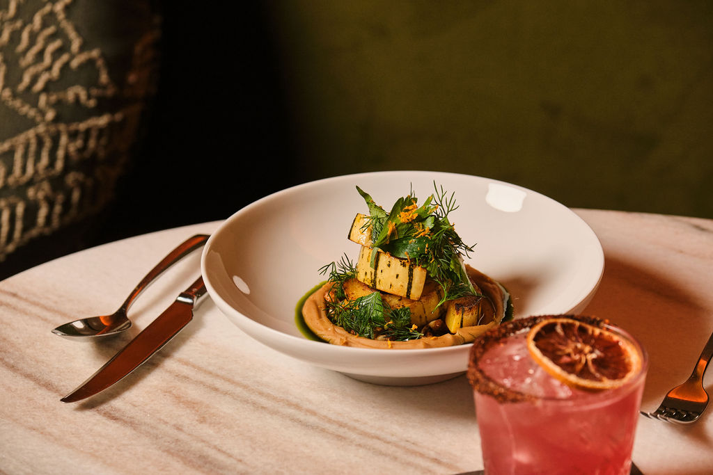 a plate of food and a drink