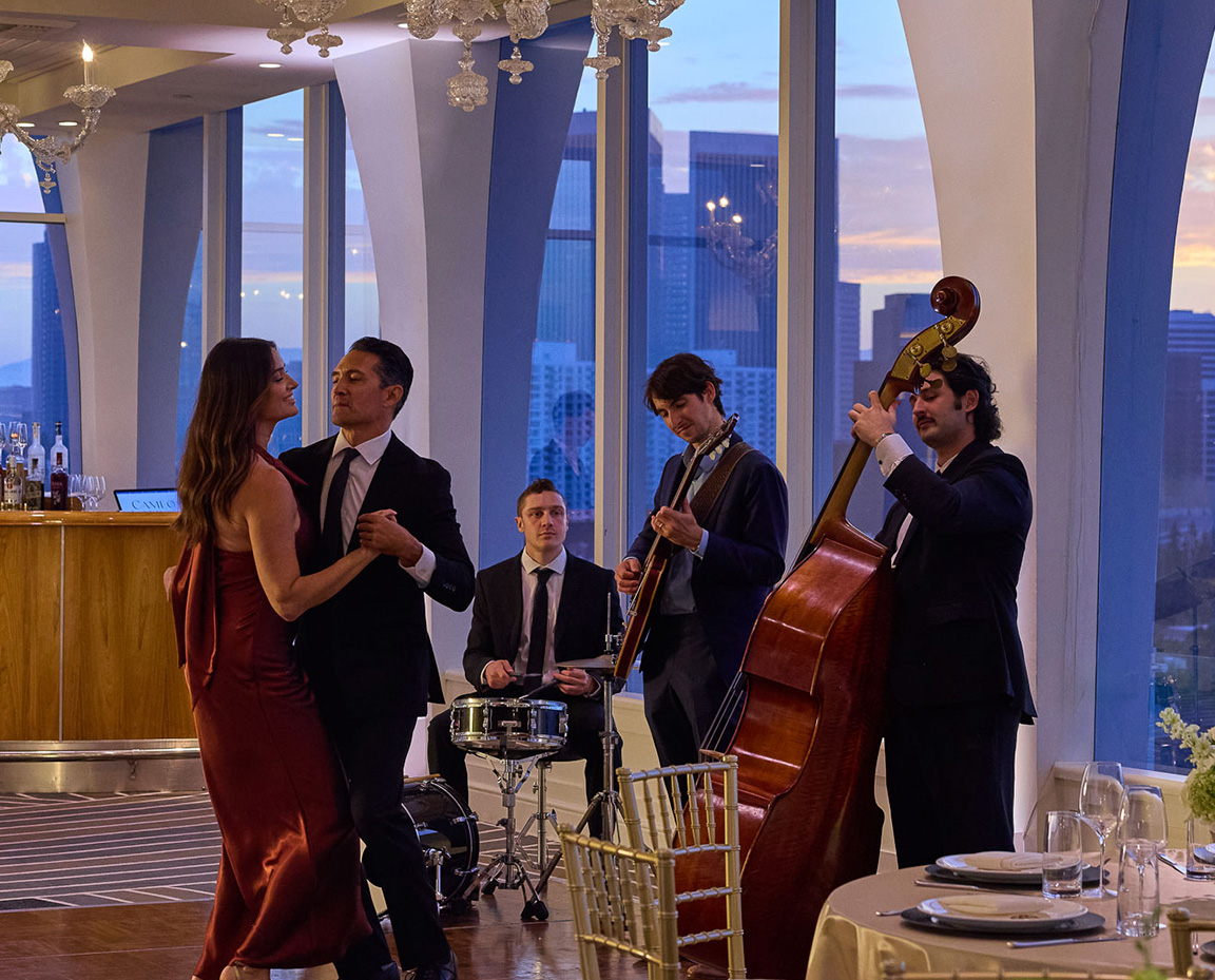 a group of people dancing in a room
