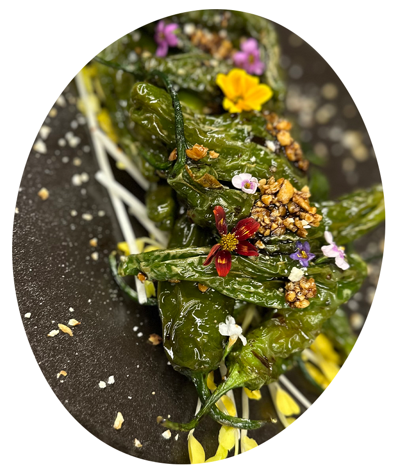 a green peppers with flowers on it