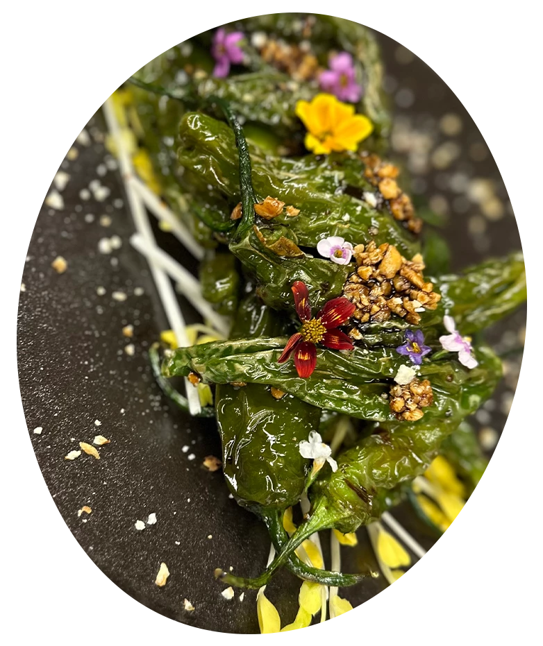 a green peppers with flowers on it