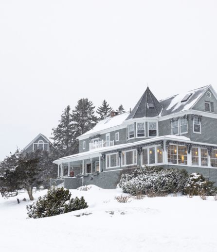 a house with snow on the ground