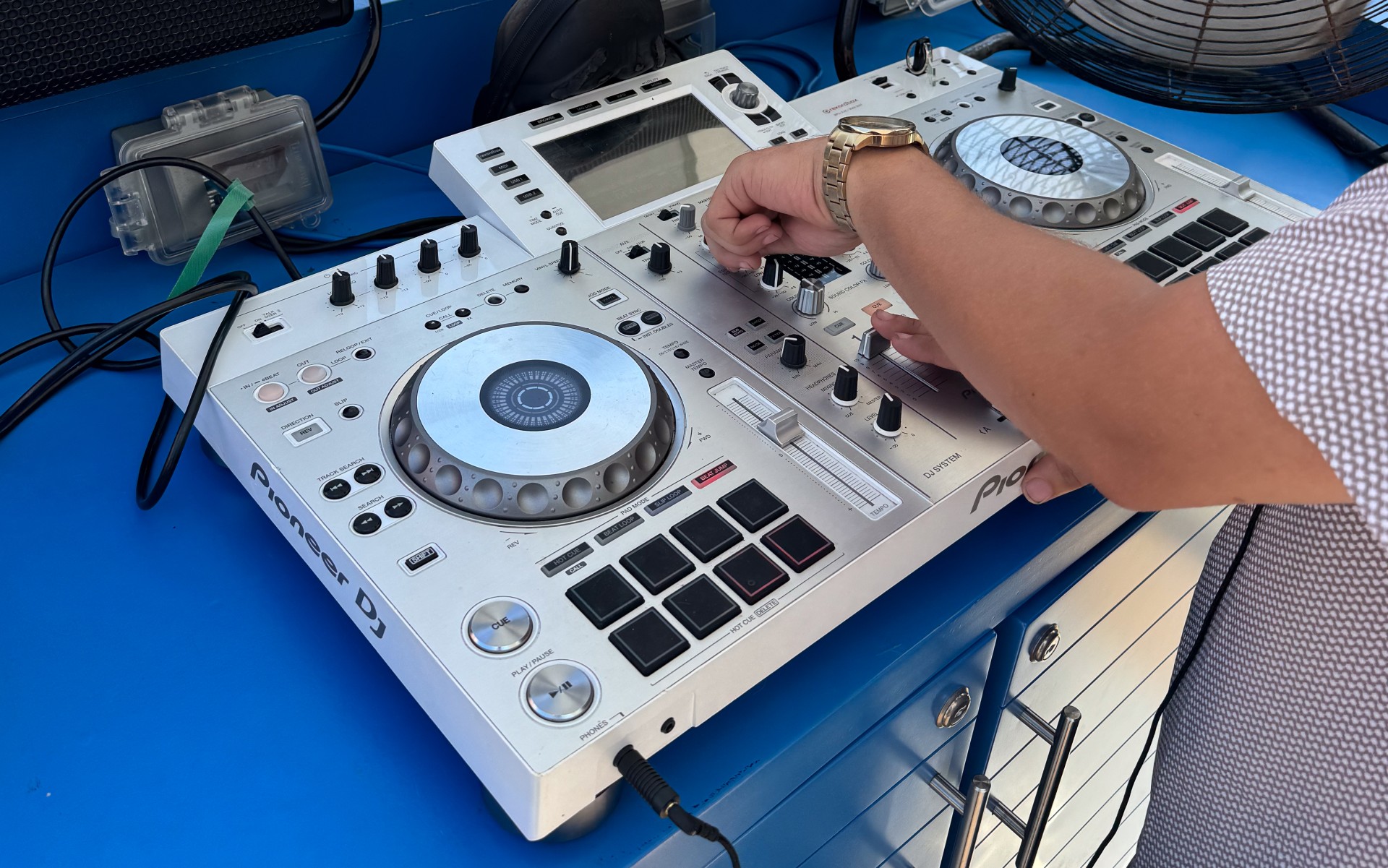 a person using a dj mixer