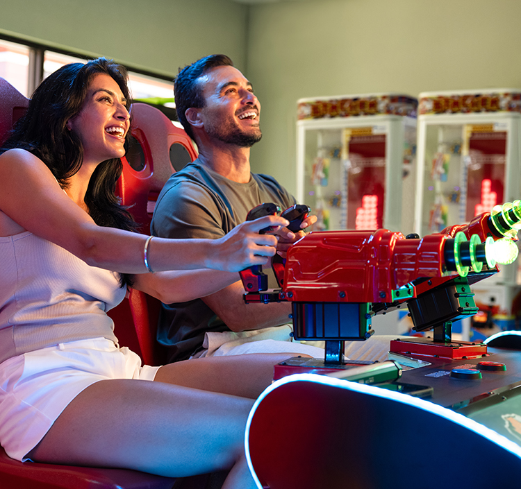 a man and woman playing a video game