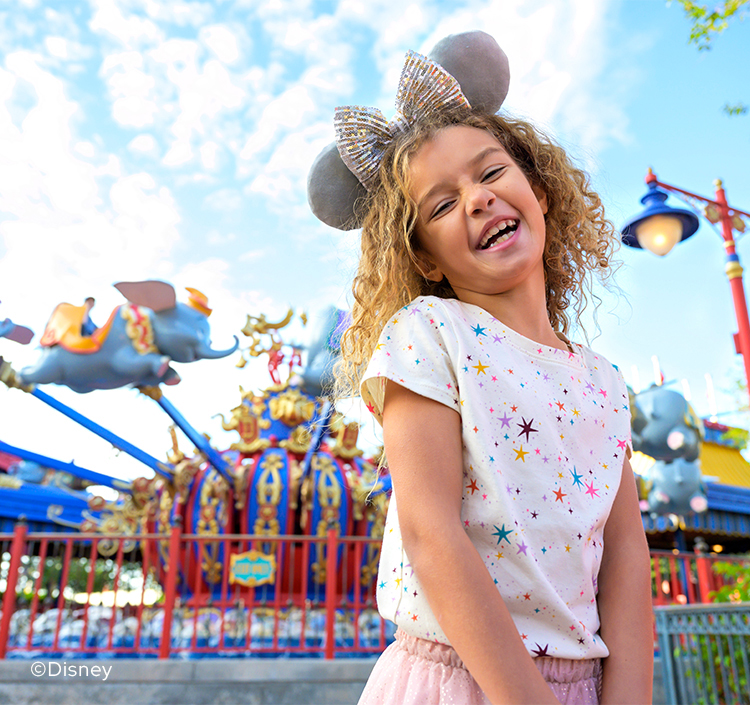 a girl smiling at the camera