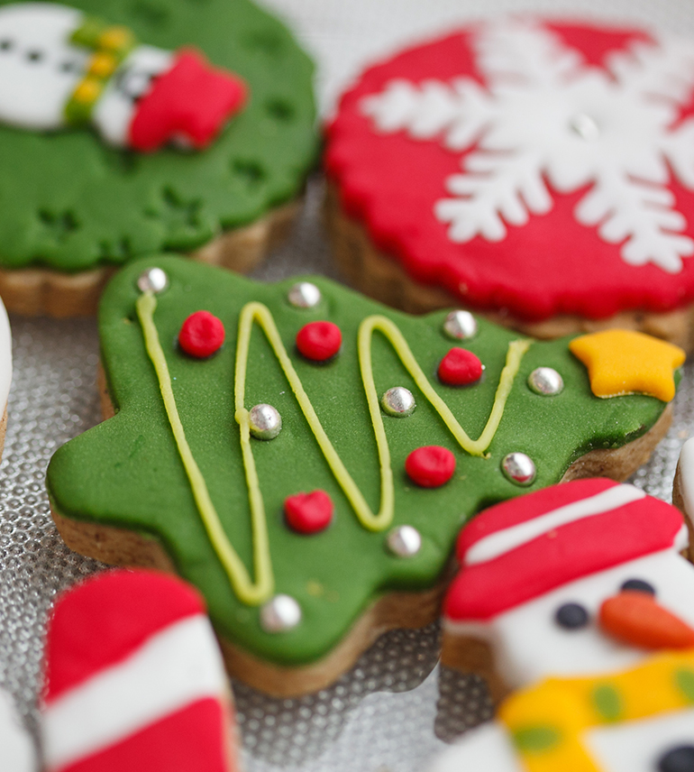 a group of decorated cookies