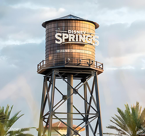 a water tower with a sign on it