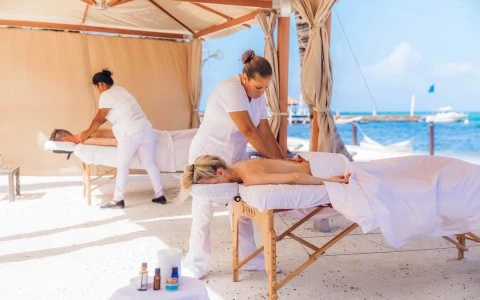 a group of people in white clothes