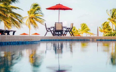 a table and chairs on a dock