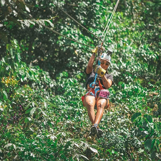 a person on a zip line
