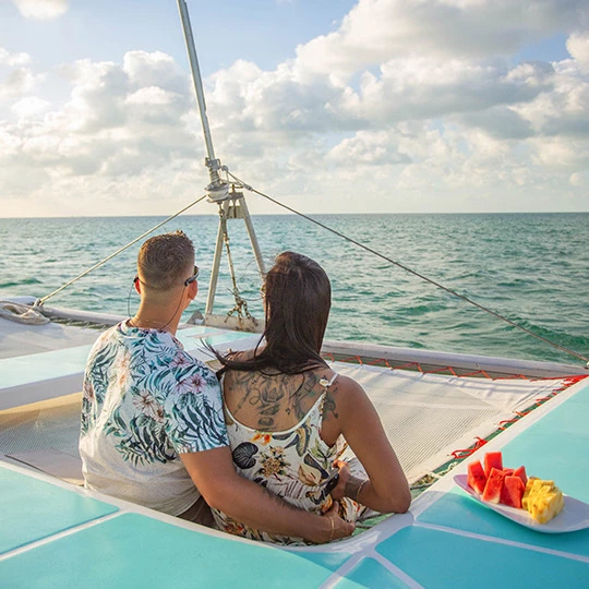 a man and woman on a boat