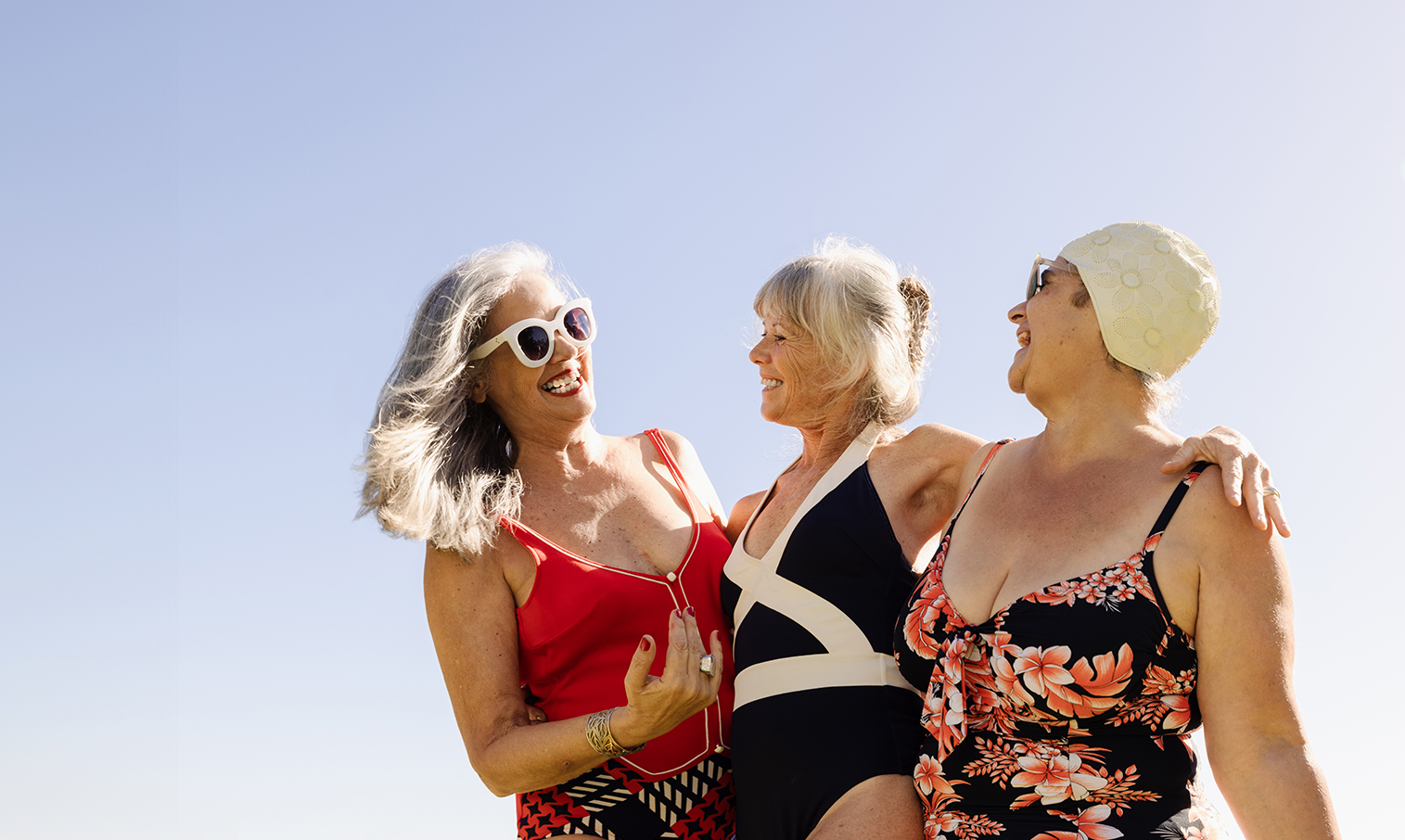 a group of women in swimsuits