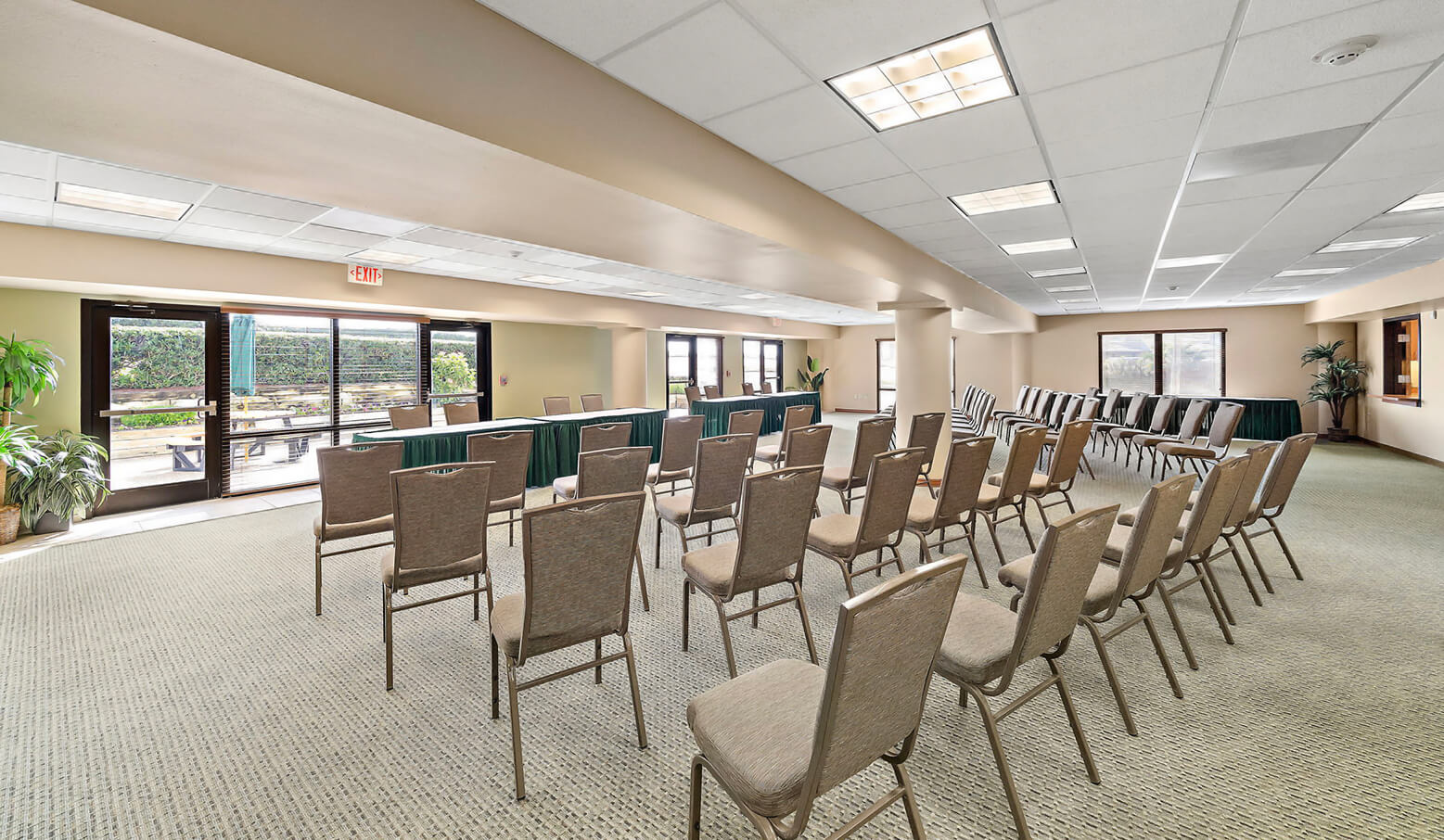 a room with chairs and tables