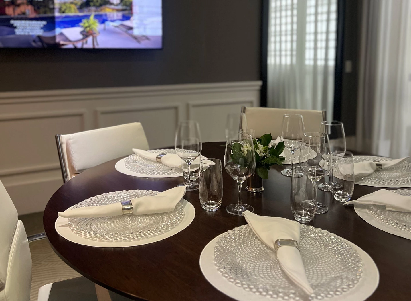 a table setting with plates and glasses
