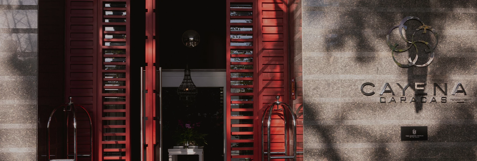 a red door with a metal ladder