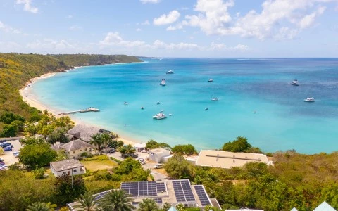 a body of water with boats and buildings