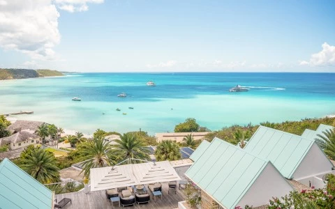 a view of a beach and a body of water from a building