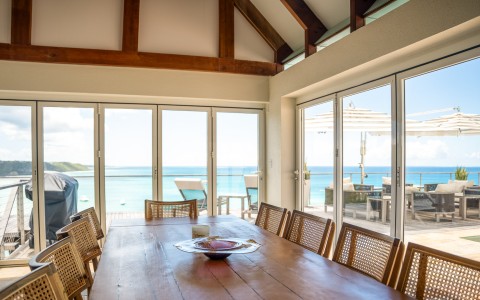 a table with chairs and a bowl on it