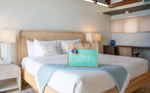 a bed with a bag on it