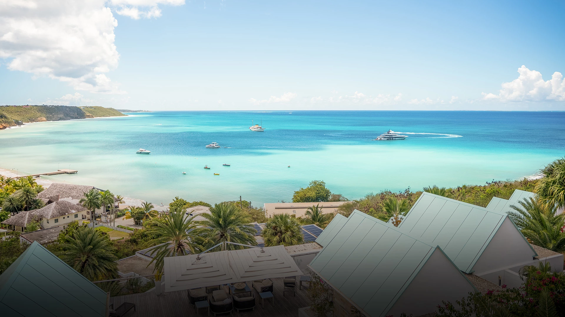 a view of a beach and a body of water from a high point
